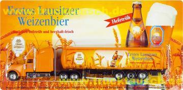 Löbauer Bergquell Erstes Lausitzer Weizenbier, mit Logo, Glas, Flasche und Gerste vor Sonne
